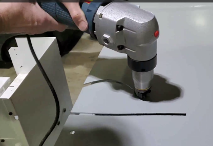 demo of motion constrained sheet metal nibbler 2